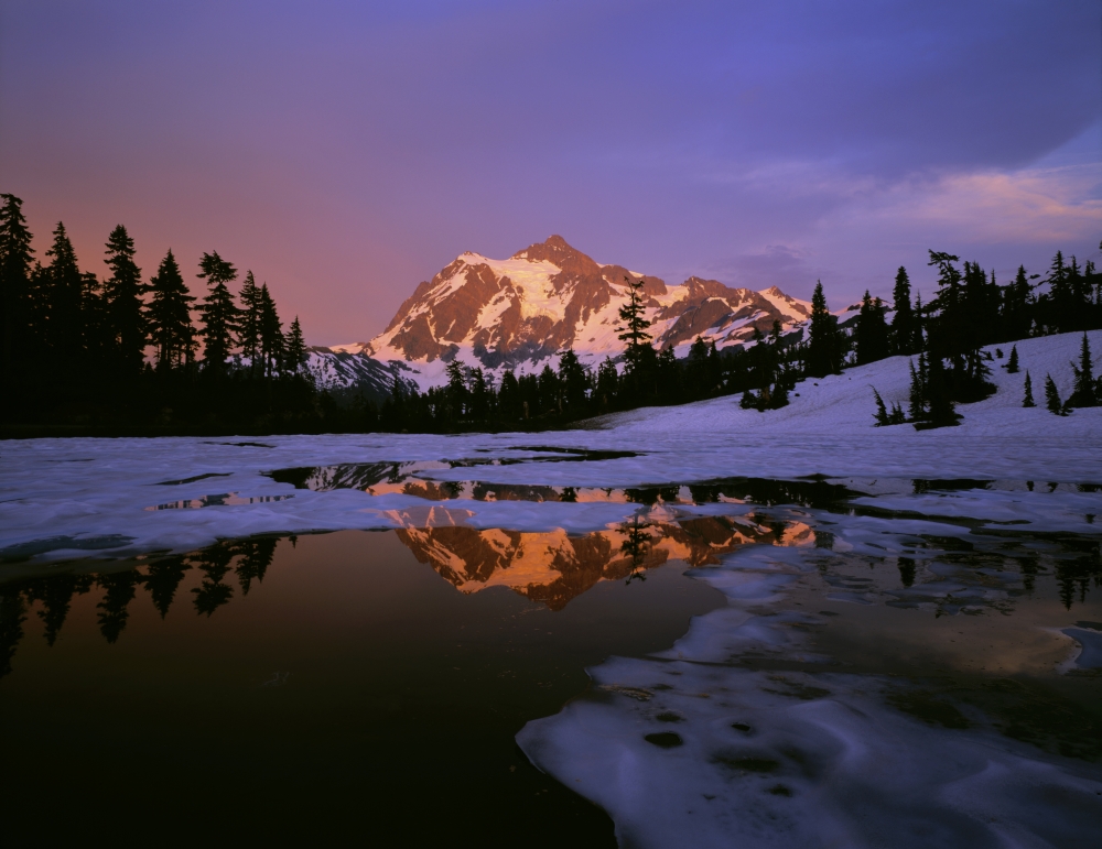 Mt. Shuksan Reflecting Into A Partial Ice Covered Picture Lake At ...